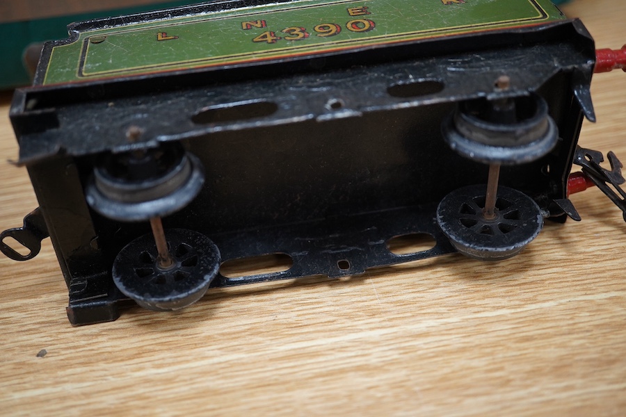 A Bing for Bassett Lowke 0 gauge tinplate clockwork LNER Ivatt 4-4-0 tender locomotive, 4390, together with an early Hornby clockwork 0-4-0, 2710, in GNR green livery with Meccano Ltd roundels to locomotive splasher and